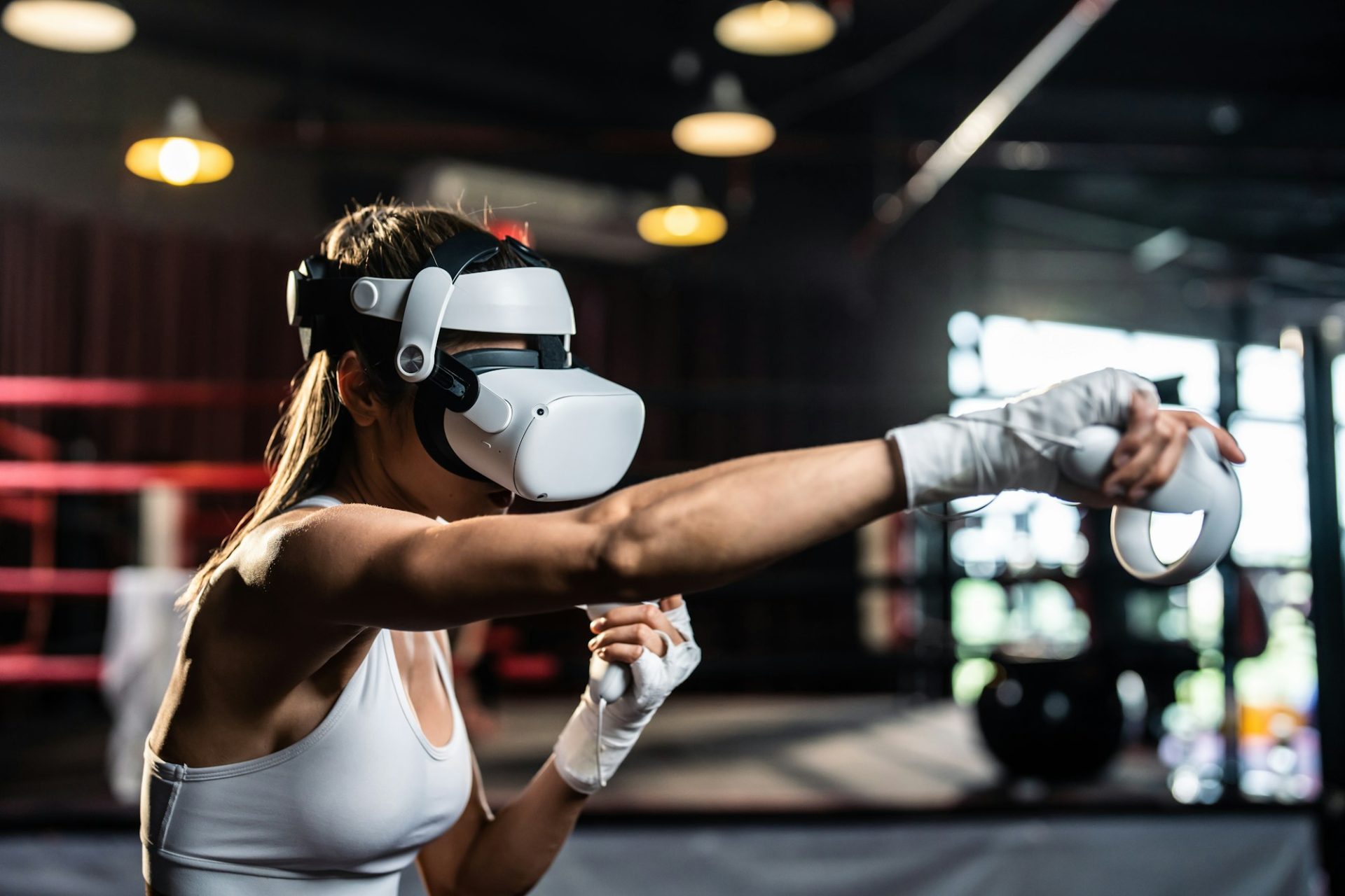 sportswoman-using-innovative-technology-vr-glasses-for-exercise