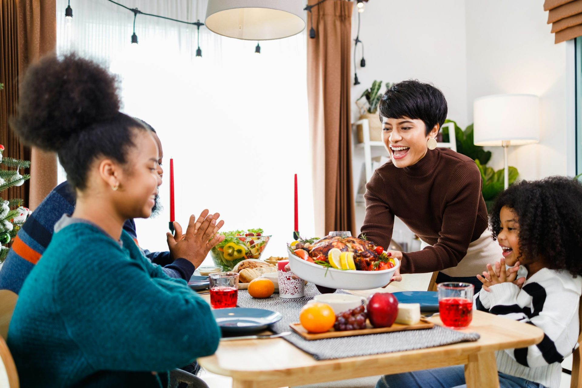 merry-christmas-happy-african-american-family-are-having-dinner-at-home